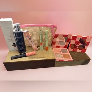 Ipsy glam bag full of goodies! Benefit, Symbosis, Pixi, & Crate products.